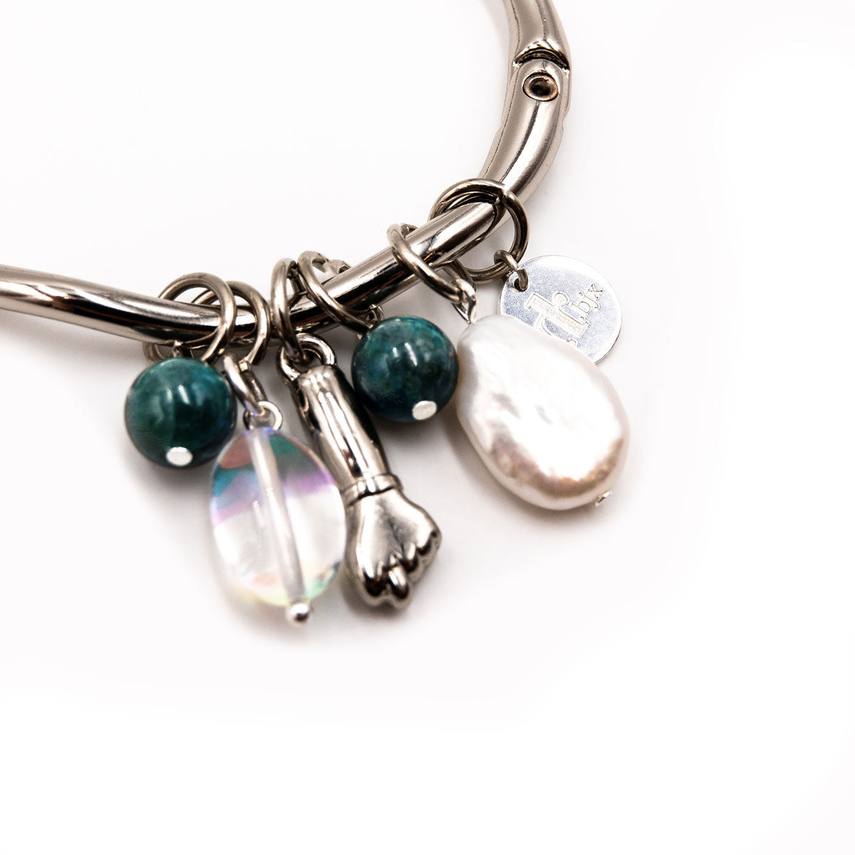 Silver bangle with multiple pendants